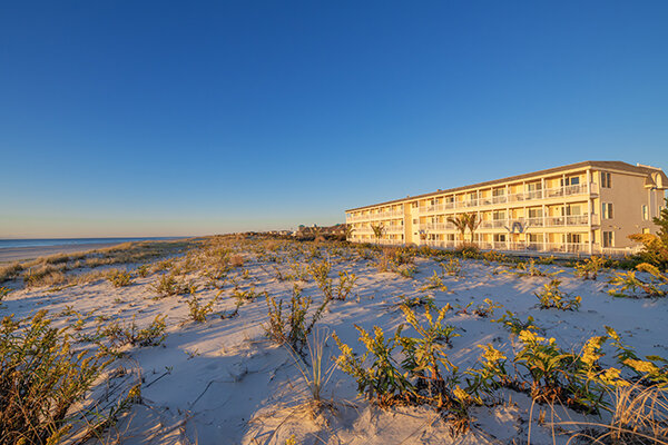 exterior of lbi hotel from beach