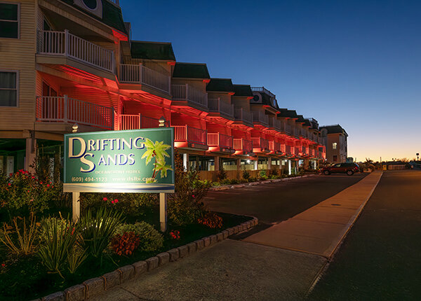 exterior of long beach island hotel at dusk