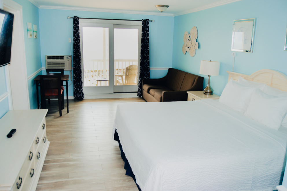 a room with a bed and a couch